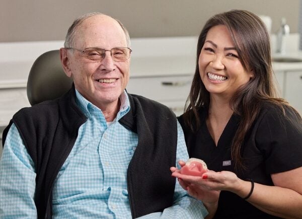 Patient Smiling with Staff Member