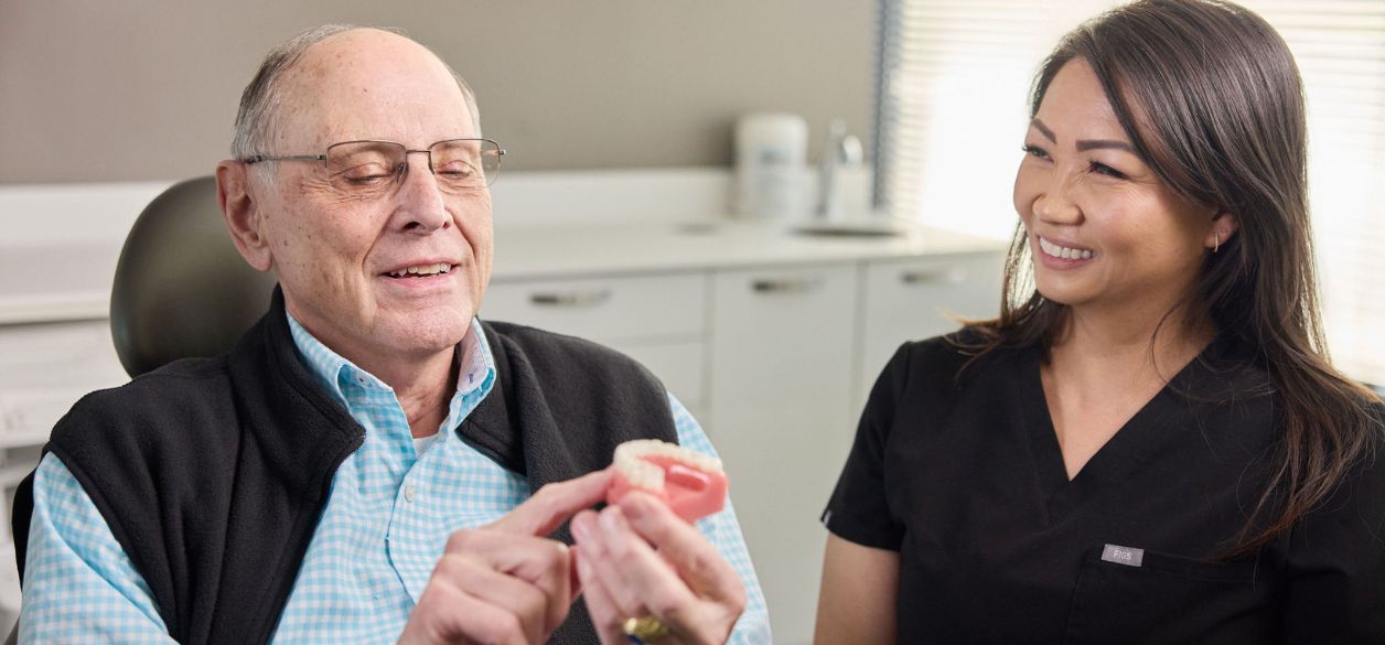 CascadesONE Dental professional consulting a patient on veneers