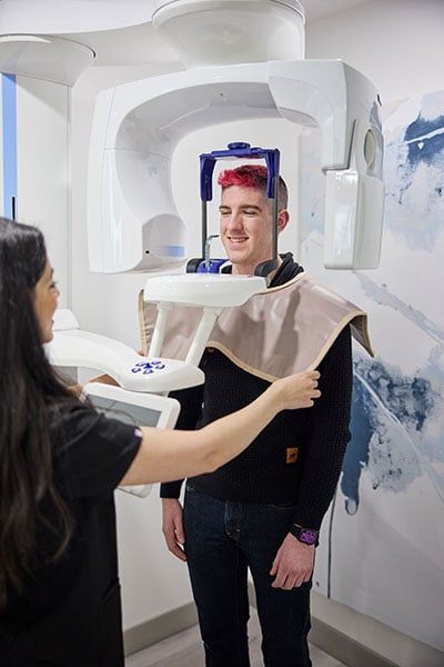 Young Adult Getting Dental X-Ray at CascadesONE Dental