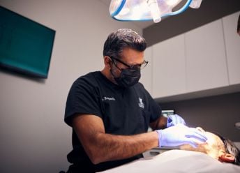 Dr. Ruparelia performing a root canal