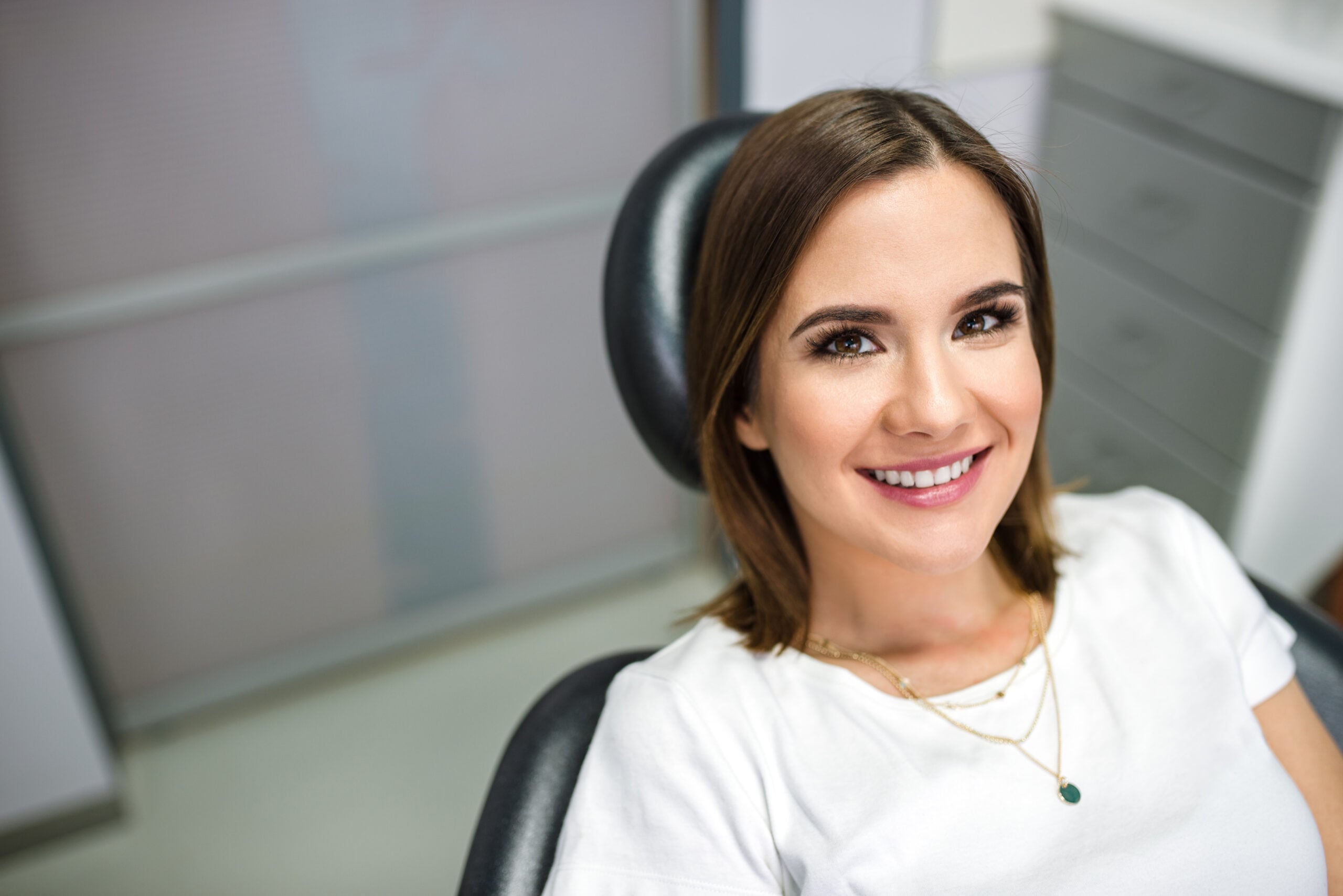 Woman smiling in dentist chair