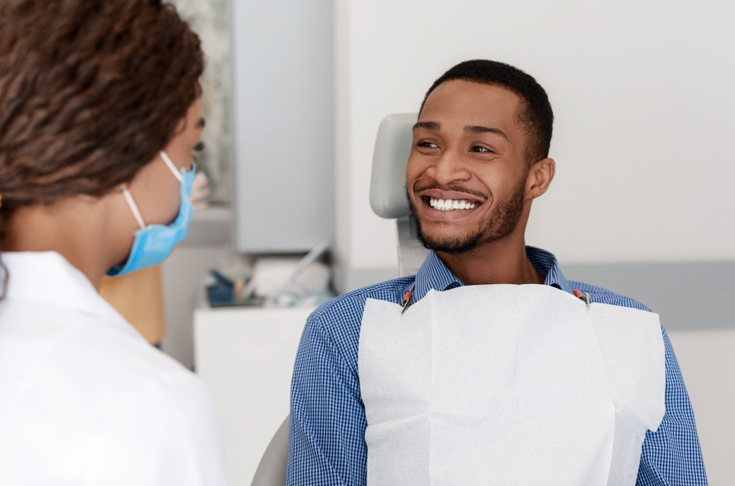 Man smiling in dentist chair